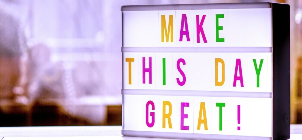sign which says - make this day great